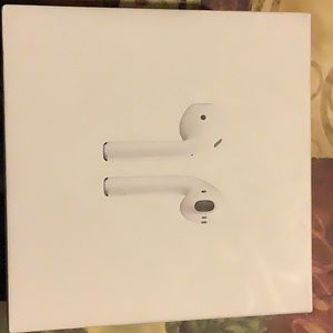 APPLE AirPods w/ wireless charging case.